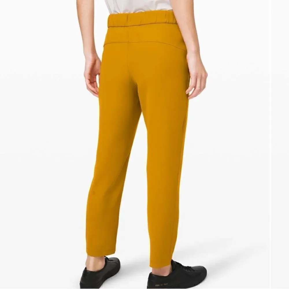Lululemon On the Fly 7/8 Pant *Woven Fools Gold Size 4